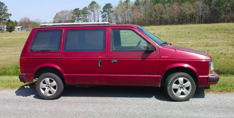 Illustration for article titled Why Buy This 33k-Mile Porsche 911 for Over $165,000 When You Can Get a 254k-Mile Turbo Plymouth Voyager for $3,500?